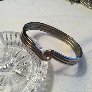 $10 ea or 3/$20 Silvertone Wave with Crystal Brace